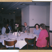 MAF0270_photograph-of-four-people-at-a-banquet.jpg